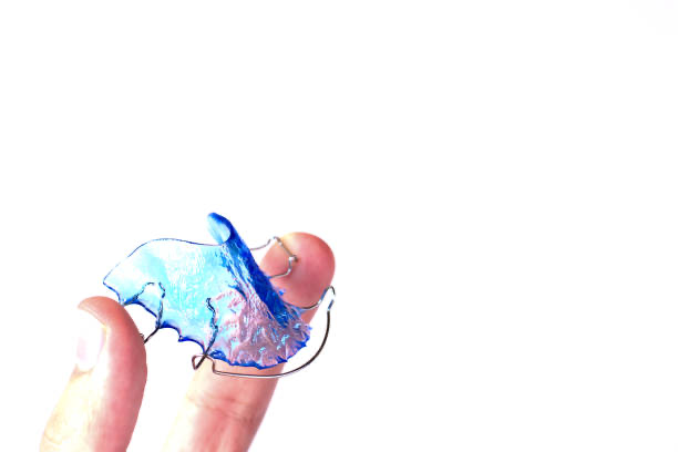 Hawley retainer with personalized blue acrylic and a shaped wire